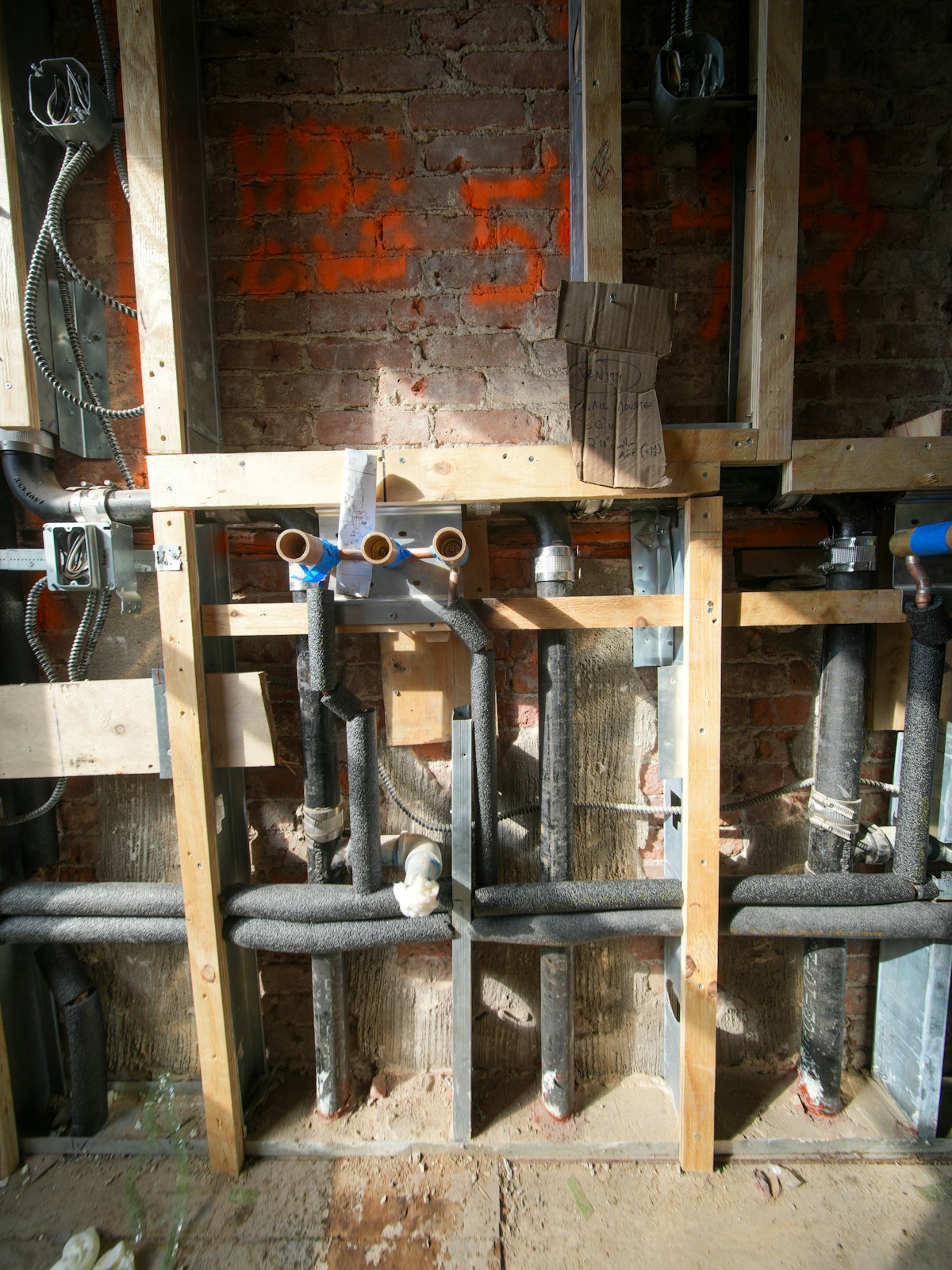 Core drilling a boiler flue hole through brick